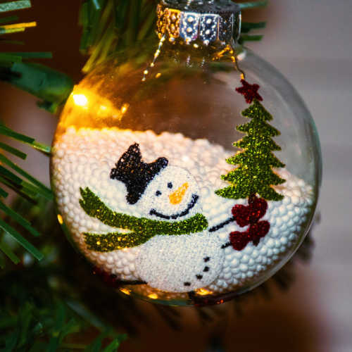 Christmas Tree ornament with snowman design.