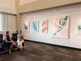 Photo of people in an art gallery.