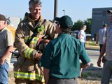 Firefighter talking to citizen